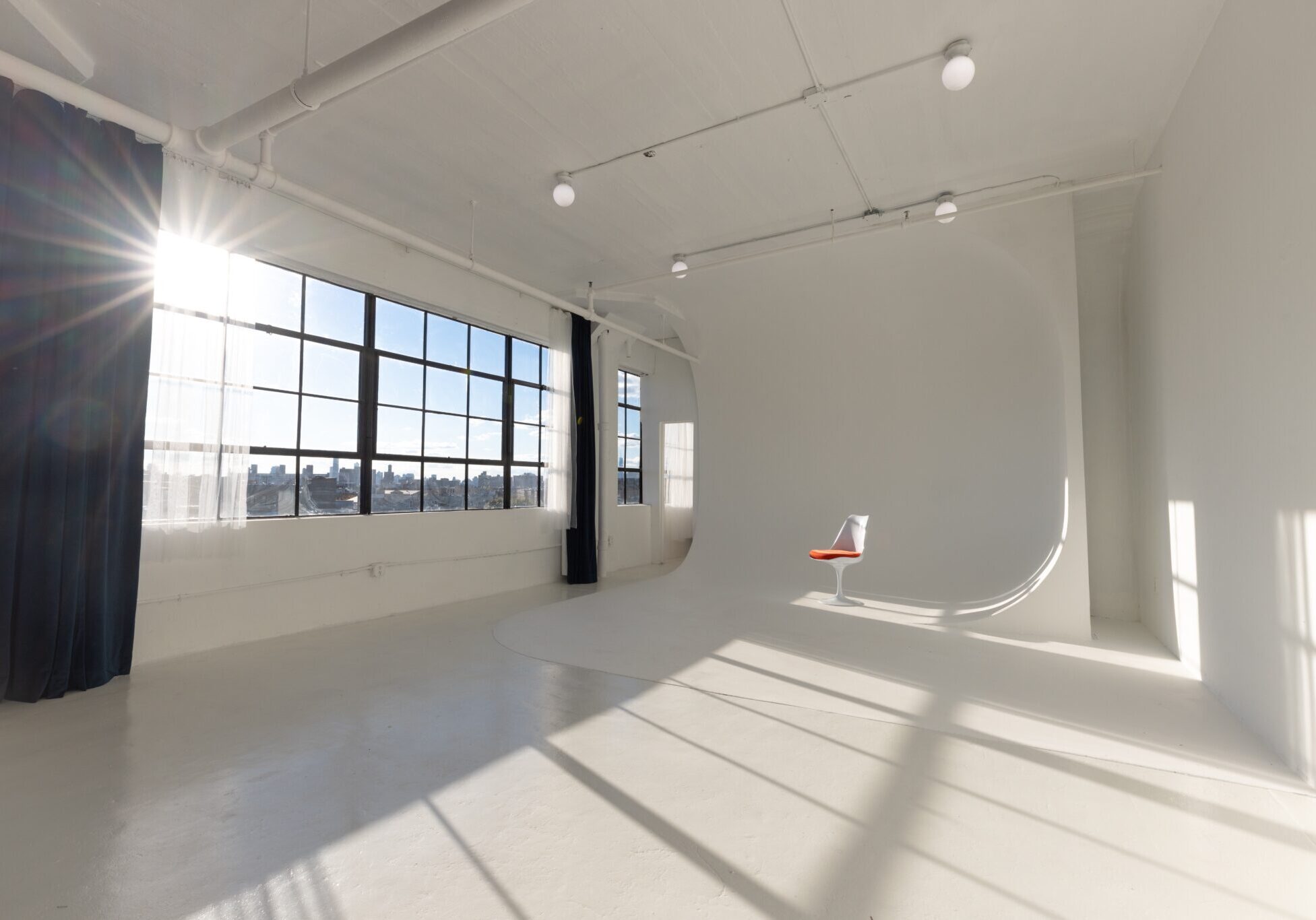 Elegant cyc space with sunny windows and Brooklyn views